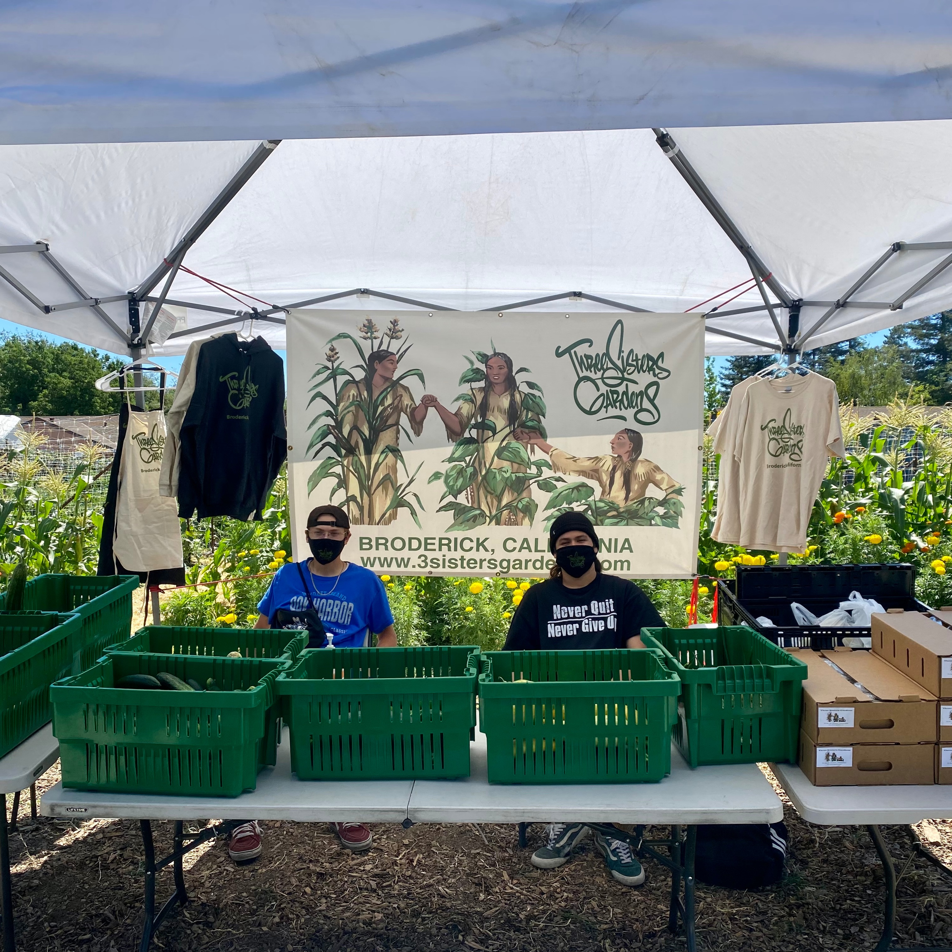 Two volunteers in a booth